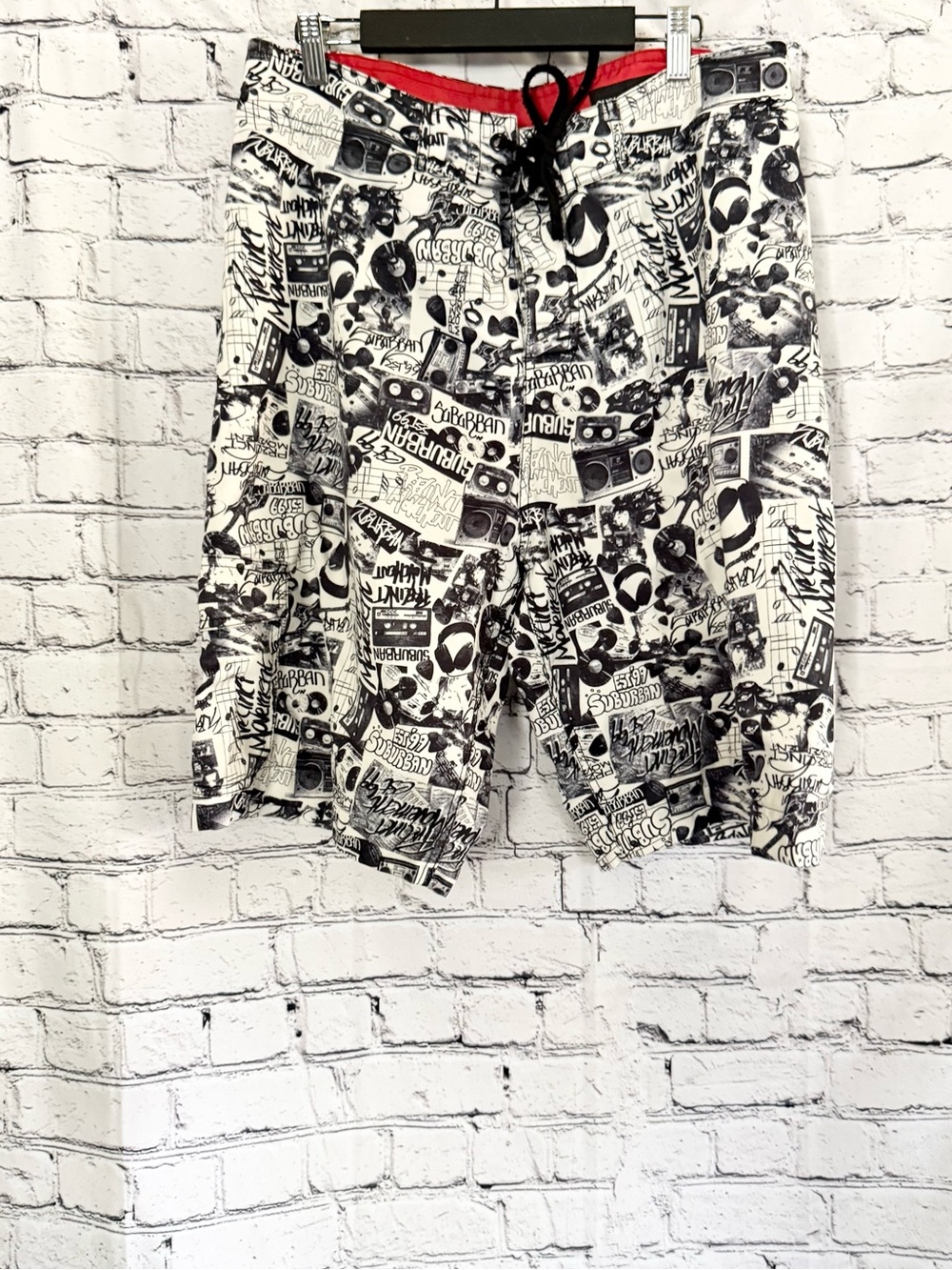 SUBURBAN. Swim shirts.